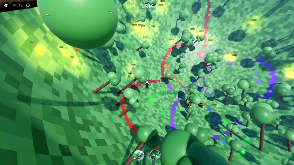 High angled view down into Emilie's Bowl World showing dense trees, glowing coins, colorful painted trails, and a player on the curved wall.