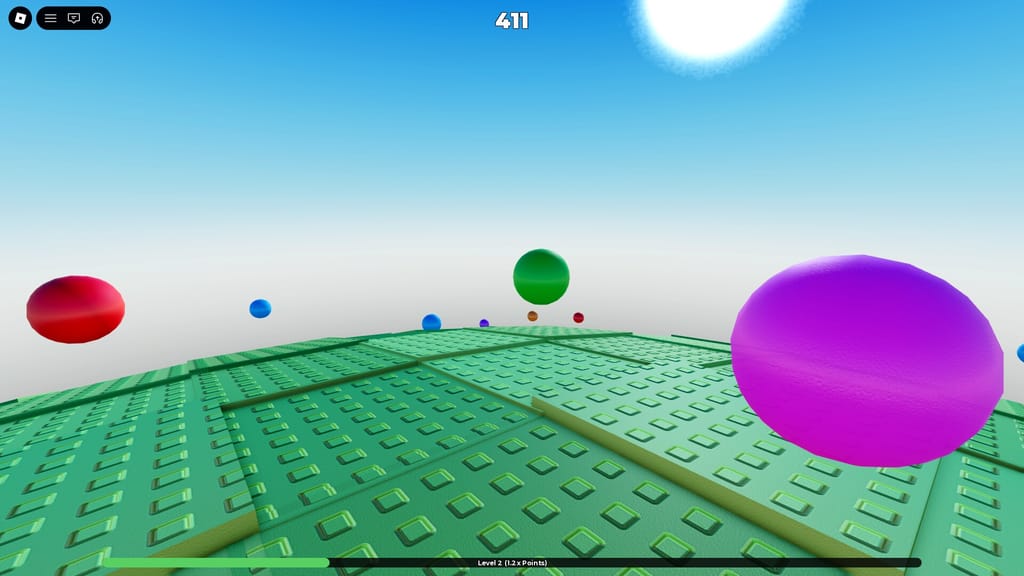 Large pink, green, red, and blue paint spheres floating above the curved green surface in Emilie's Obby Planet.