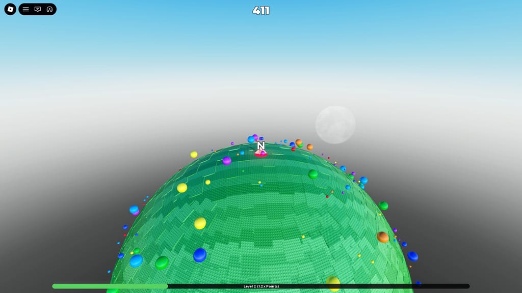 A wide view across Emilie's green Obby Planet covered with colorful paint sphere pickups beneath a pale moon.